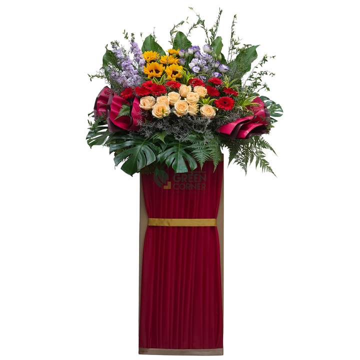 Summit Majesty grand opening flower stand with sunflowers, red gerbera and champagne roses — The Green Corner Singapore